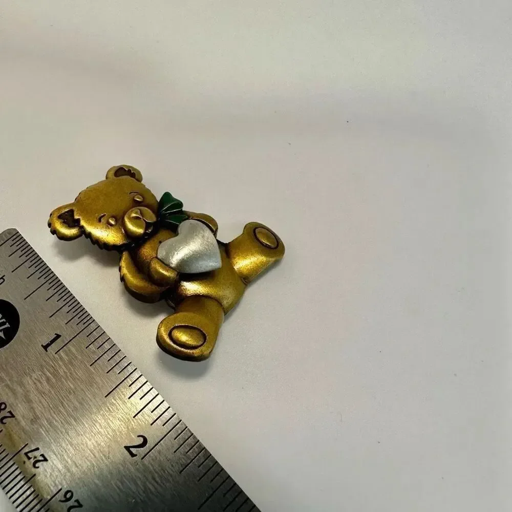 Jeanette Jewelry Gold and  Silver tone Bear holding a heart brooch
